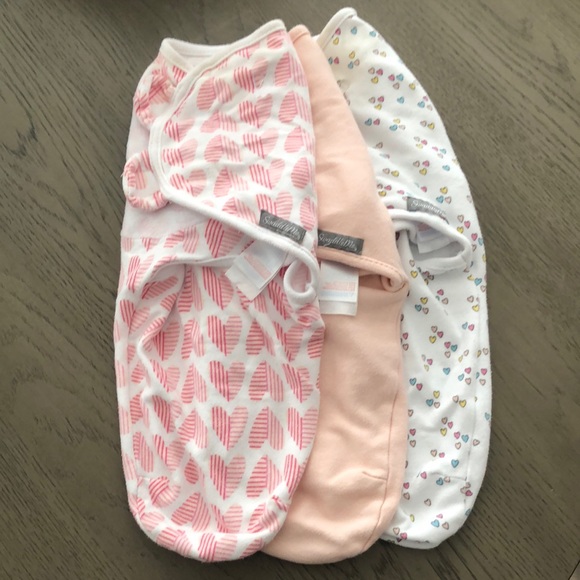 SwaddleMe Other - Slight discoloration around neck opening, baby swaddles.